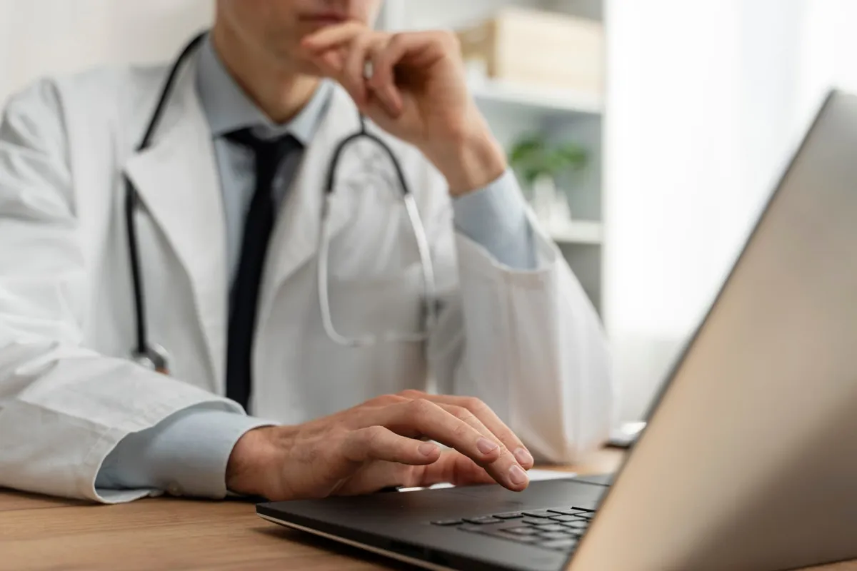 Doctor consulting on a computer